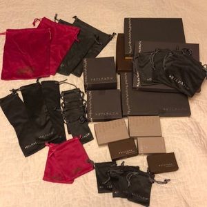 Assorted Silpada boxes and bags